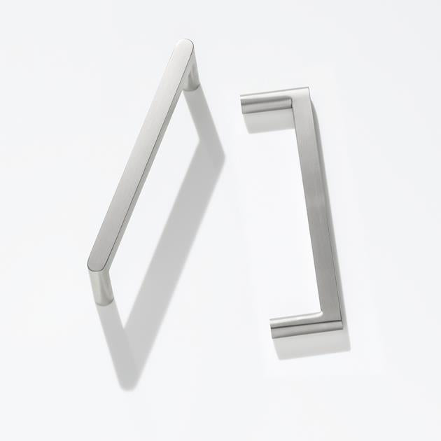 White metal handle door hardware